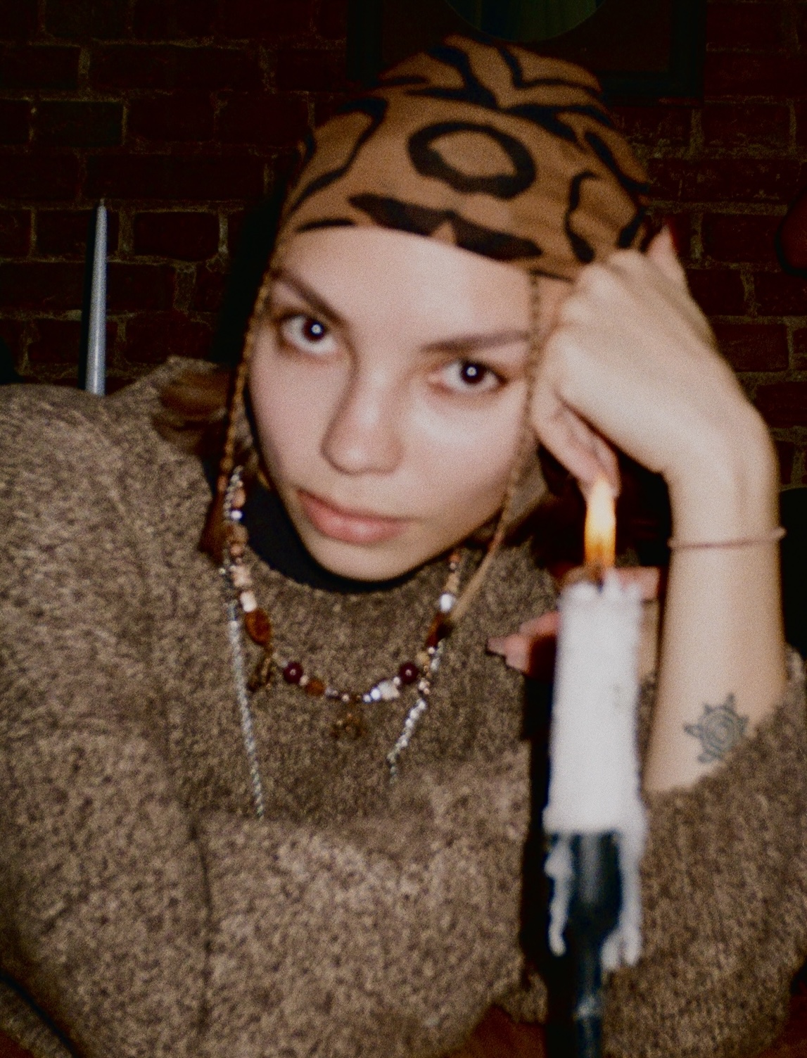me with a candle in a bandage and mystical style